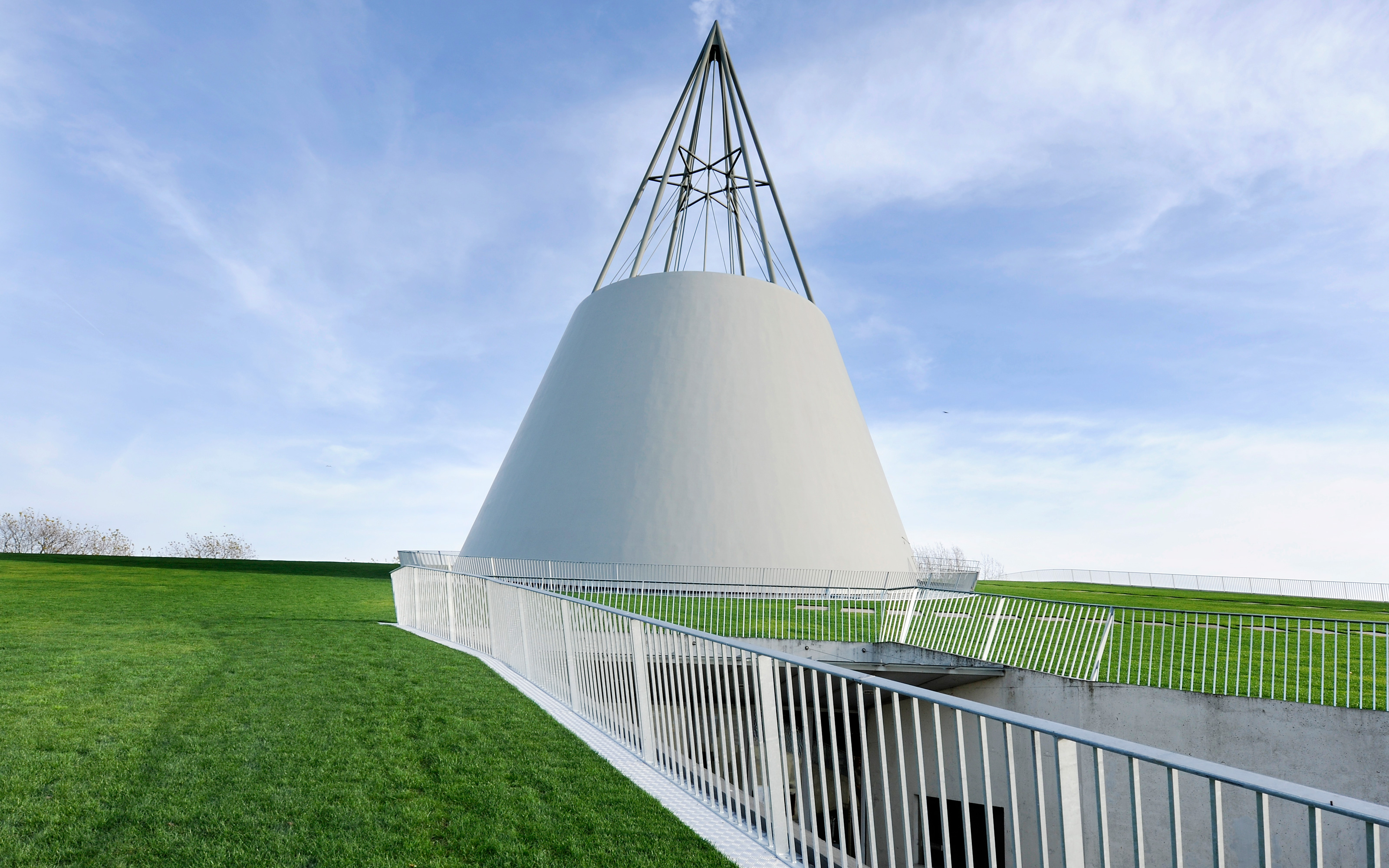 Railings provide safe access to the green roof. Green roof with lawn and railing